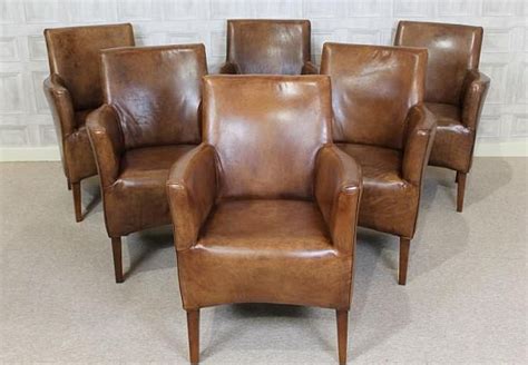 SMALL LEATHER ARMCHAIR