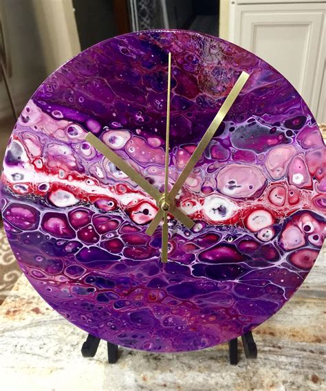 Fluid acrylic pouring on a clock. By Waterfall Acrylics. | Acrylic pouring art, Resin painting ...