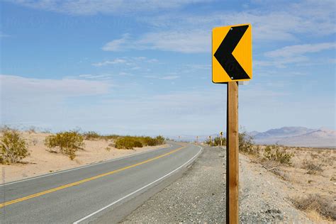 "Turn Ahead Sign Along Remote Desert Road" by Stocksy Contributor ...