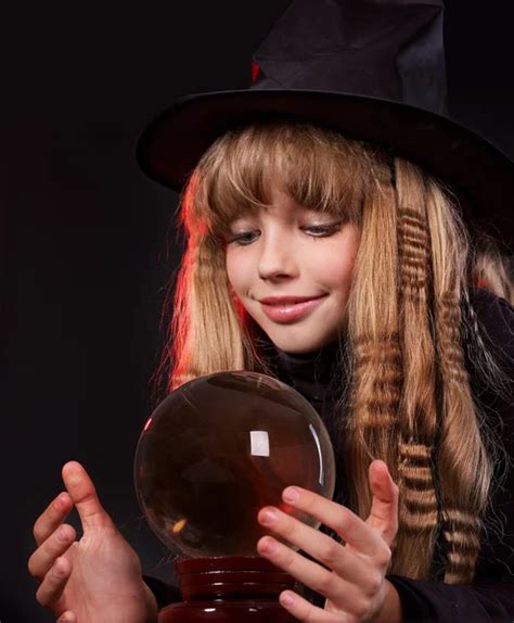 Child holding crystal ball. — Stock Photo © poznyakov #7112068