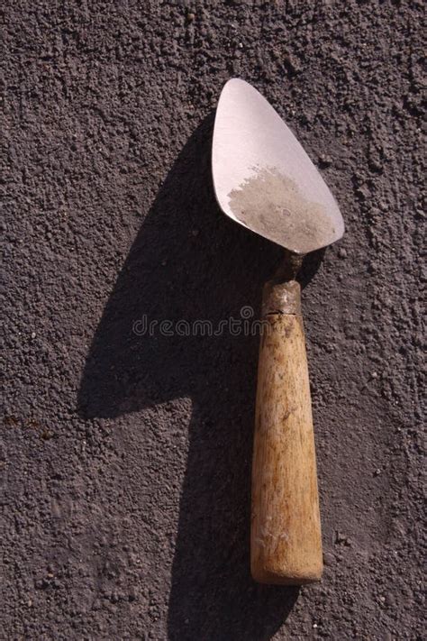 A Trowel is a Mandatory Tool Used by Builders To Level Cement Stock ...