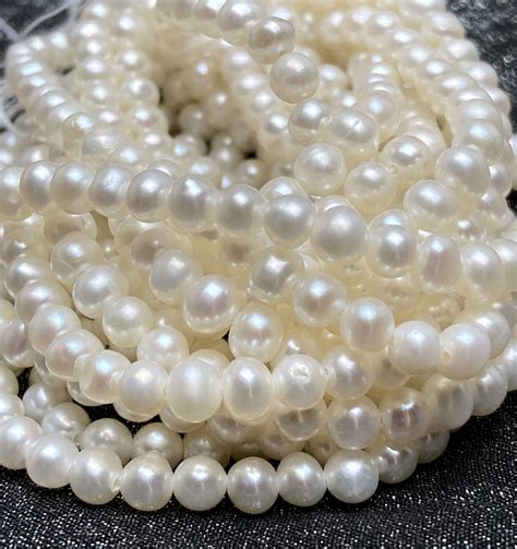 3.5mm - 4mm White Round Pearls Grade AAA 16" Strands - carolinabeadshop.com