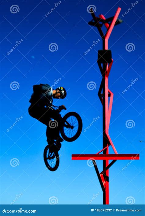 Bike stunts on the street stock photo. Image of hanging - 183575232