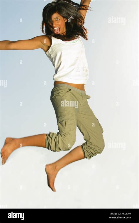 A person jumping very high into the air Stock Photo - Alamy