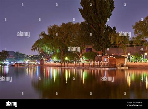 Night view of the Shichahai historic scenic area consisting of three lakes in central Beijing ...