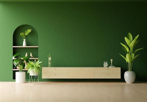 Free Photo | Wood sideboard in green living room with copy space