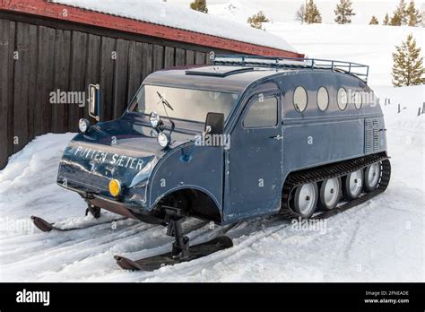 Oldtimer, Auto Neige, Bombardier snowmobile B12 with skis and chains in ...