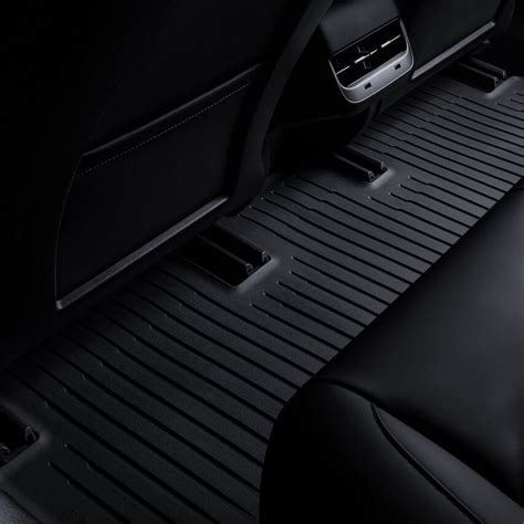 Tesla launches new and better Model 3 floor mats made of recyclable material - Electrek