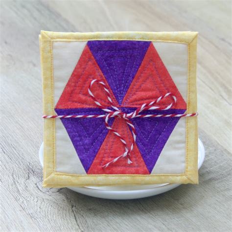 Set of four quilted coasters with a traditional... - Folksy