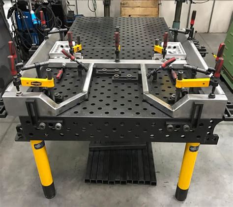 DCT’s modular fixturing system for welding features precision machined welding tables and a ...