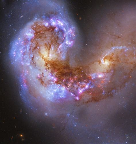 The Antennae Galaxies - Two Spiral Galaxies Merging to Become One Single Elliptical Galaxy ...