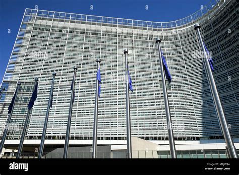EU flags in front of Berlaymont building, headquarters of the European Commission, on Rue de la ...