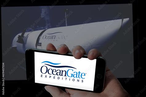 CHENNAI, INDIA 03TH JULY 2023: Ocean Gate logo in holding mobile screen ...