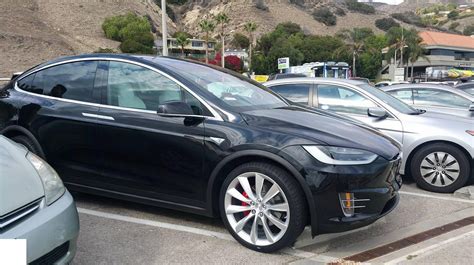 Elon Musk at Malibu Pier with the X : r/teslamotors