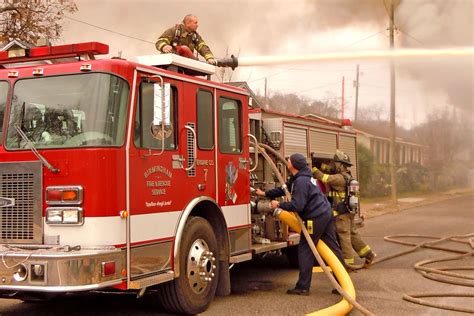 It took the water cannon to knock the flames down. Photo: Ross Callaway ...