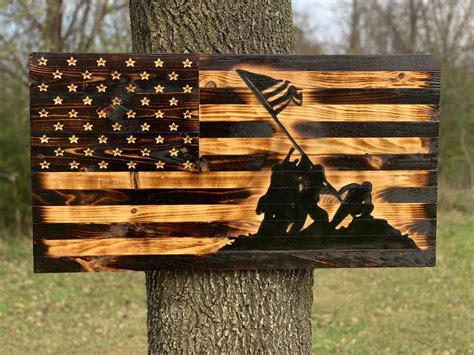 This is a hand made rustic wooden flag depicting one of the most iconic scenes in American ...