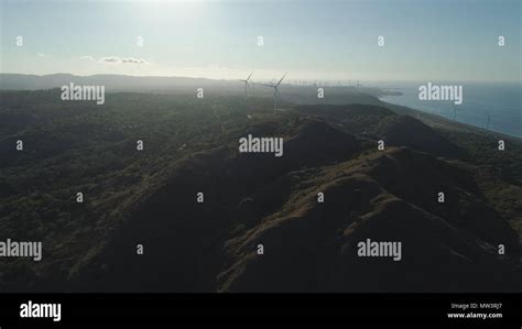 Aerial view of Windmills for electric power production on the seashore ...