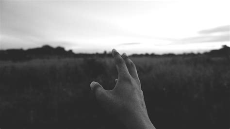 Premium Photo | Cropped hand reaching sky