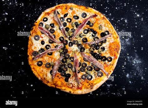 Anchovy Sicilian Pizza. Neapolitan pizza with mozzarella cheese, anchovies and olives. Authentic ...