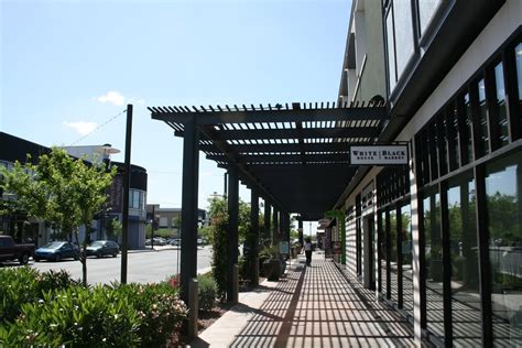 Covered walkway in outdoor shopping center | Shaded walk in … | Flickr