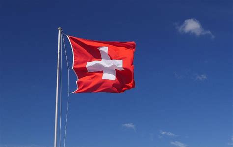The Swiss Flag: It's History, Meaning & More - SwitzerLanding