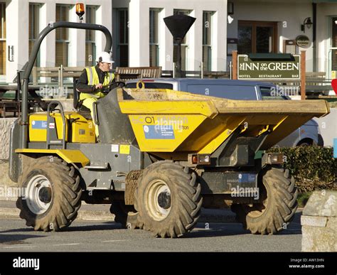 Dumper truck and driver Stock Photo - Alamy