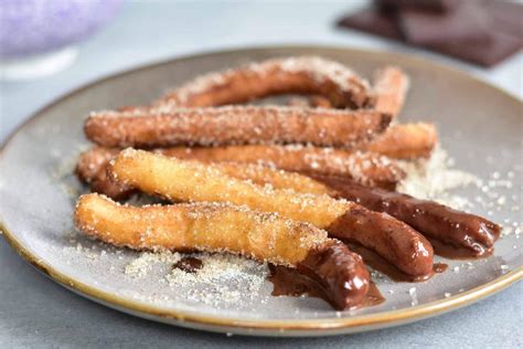 Churros with chocolate sauce (churros con chocolate) - Everyday Delicious