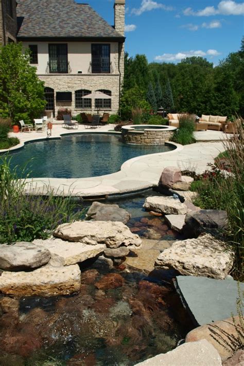 20 Landscaping Around Pool With Rocks To Enhance Your Oasis