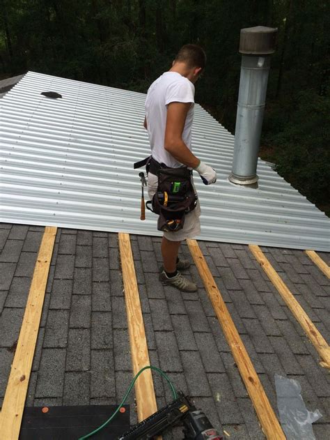 Pin by Abdi on PITCHED ROOFING AND WOOD FRAMING in 2020 | Metal roof installation, Diy metal ...