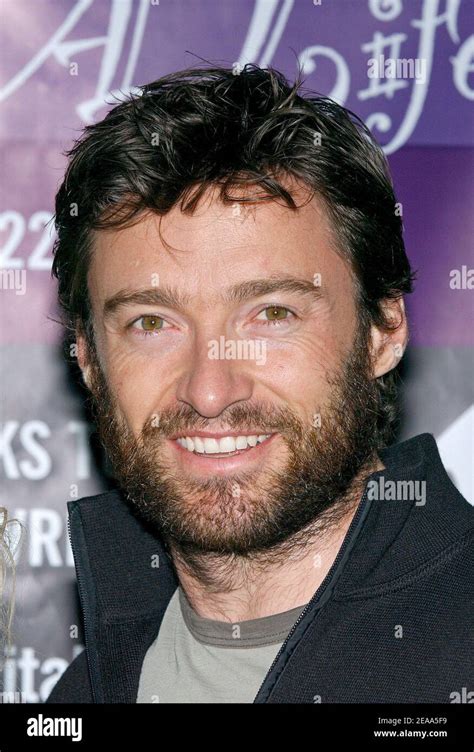 "Aussie actor Hugh Jackman poses for pictures as he arrives at the ...