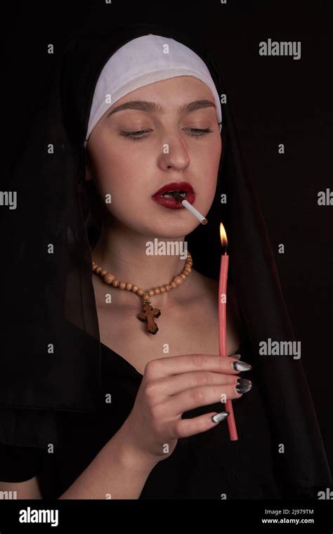 Smoking young nun hi-res stock photography and images - Alamy