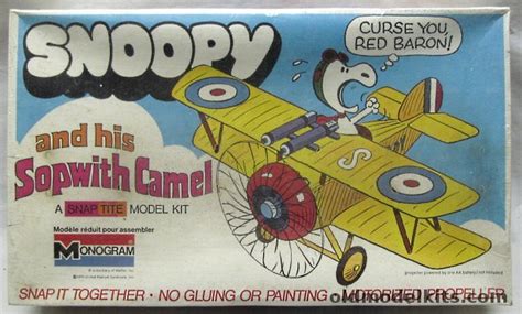 Snoopy And His Sopwith Camel Model Kit / Comes in 9 pieces molded in yellow plastic with clear ...