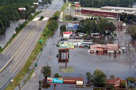 Rising flood waters from Florence menace Carolinas- kills at least 32