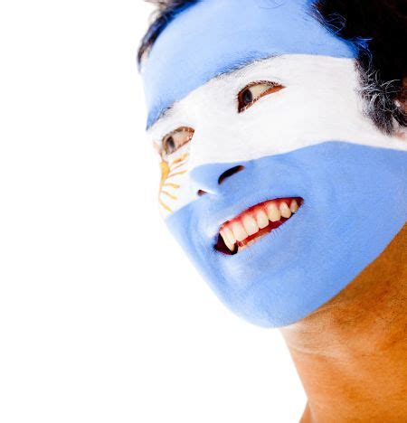 Portrait of a man with an Argentinean flag painted on his face | Freestock photos