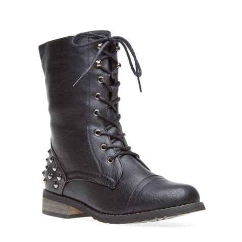 Inherit some Brit-inspired style with this rustic-turned-rocker boot, which features spiked ...