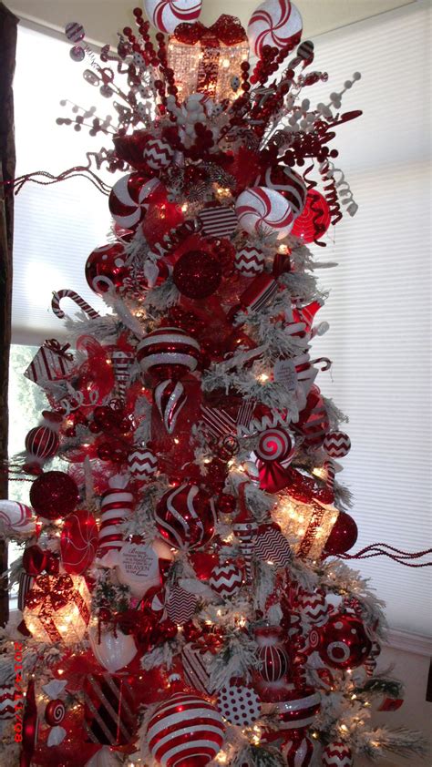 red and white tree. decorated by Mindy Meyersick | Flocked christmas trees decorated, Christmas ...