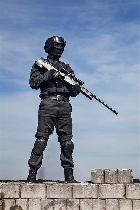 Swat Police Sniper In Black Uniform Photograph by Oleg Zabielin - Fine ...