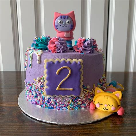 Gabbys Dollhouse Birthday Cake | Birthday party cake, Birthday cake for cat, Donut themed ...