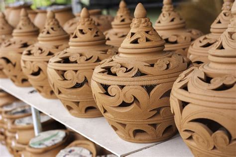 Carving Clay,Thai Traditional Clay Pottery, Selective Focus, Blu Stock Photo - Image: 59325514