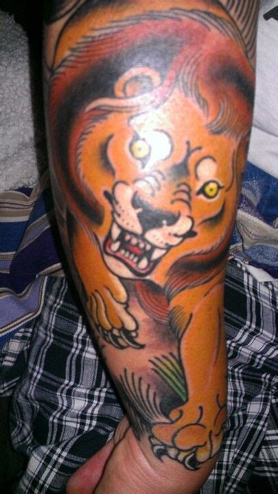 Angry Lion tattoo by Jason Vaughn | Angry lion tattoo, Tattoos, Lion tattoo