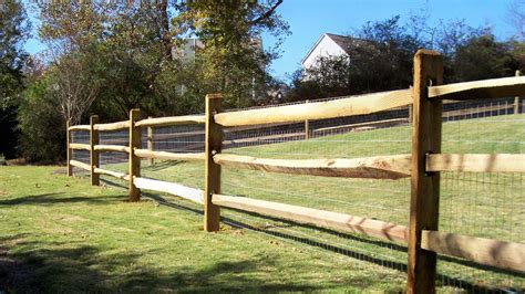 Custom wood horse fence design with wire for added protection. Mossy ...