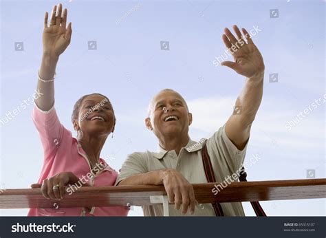 Couple Waving Goodbye Stock Photo 65315107 : Shutterstock