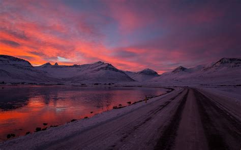 Landscape photography of snow-capped road and mountain ranges during sunset HD wallpaper ...