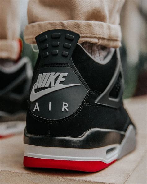 Here's How the 2019 Air Jordan 4 Black/Red Looks On Foot | Nice Kicks