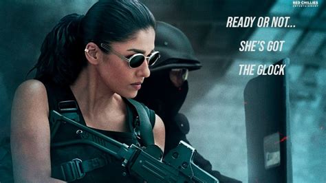 Jawan: Shah Rukh Khan drops an action-packed poster of Nayanthara, calls her the 'thunder that ...