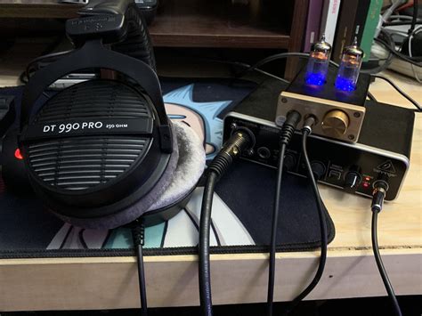 This is my beginners setup. Beyerdynamic DT 990 pro 250 w/ Nobsound NS-08E amp and Behringer ...