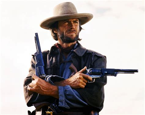 Clint Eastwood In The Outlaw Josey Wales Photograph by Silver Screen