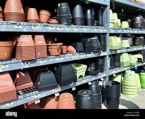 Flower planting pots for sale at Home Depot Stock Photo - Alamy