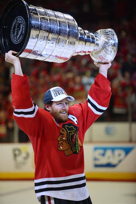 Chicago Blackhawks defenseman Duncan Keith lifts the Stanley Cup Monday ...