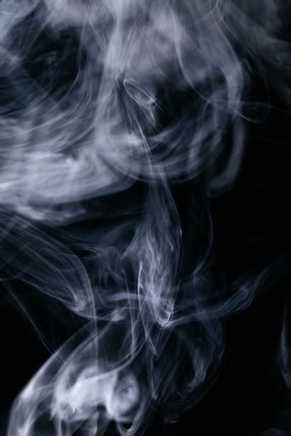 Free Photo | Grey smoke waves on black background